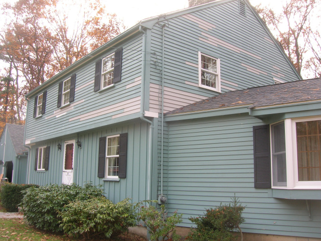 Removed and replaced rotted trim and clapboards